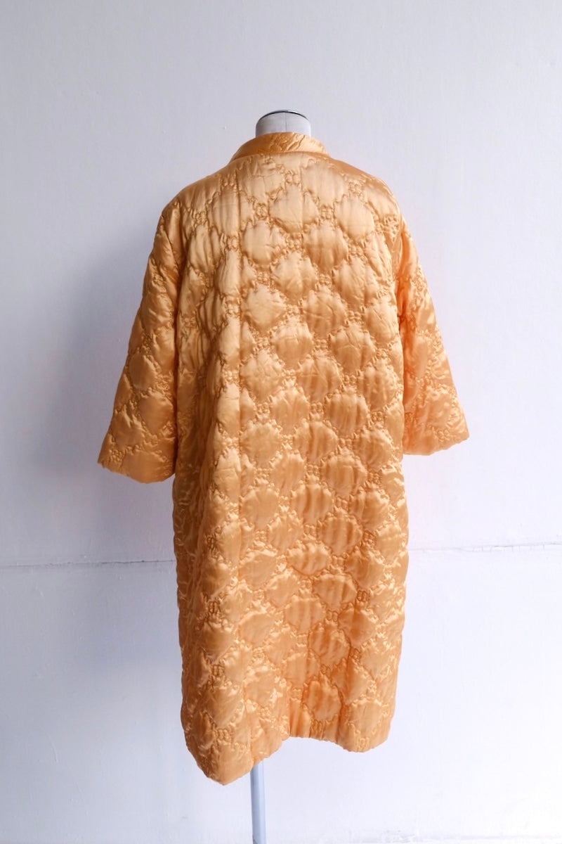 60's yellow gold quilted coat