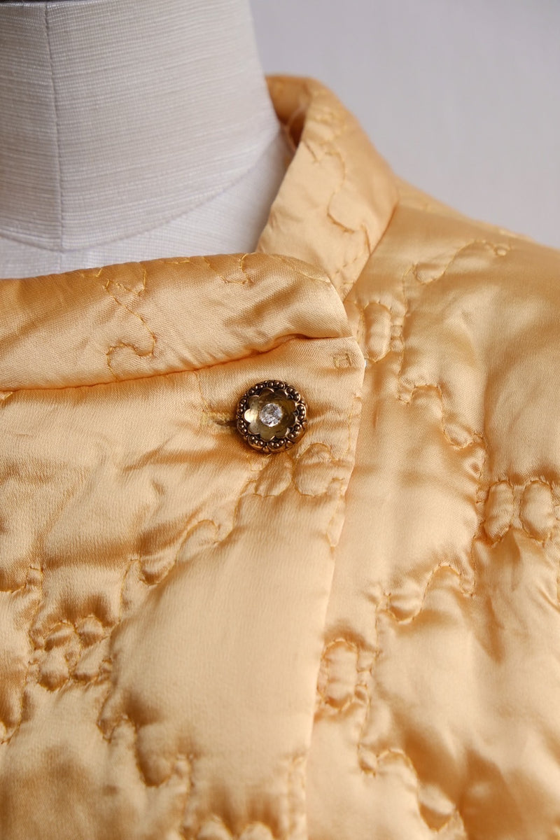 60's yellow gold quilted coat