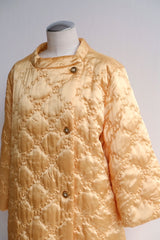 60's yellow gold quilted coat