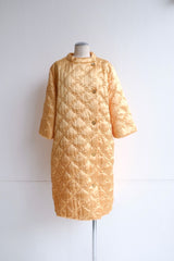 60's yellow gold quilted coat